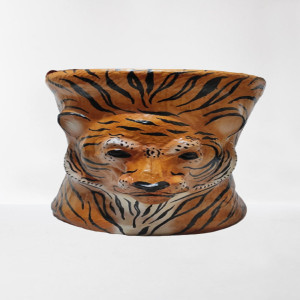 The tiger face design brings a sense of wild and exotic aesthetics to the stool, making it a bold and eye-catching addition to your interior decor. The tiger face design brings a sense of wild and exo