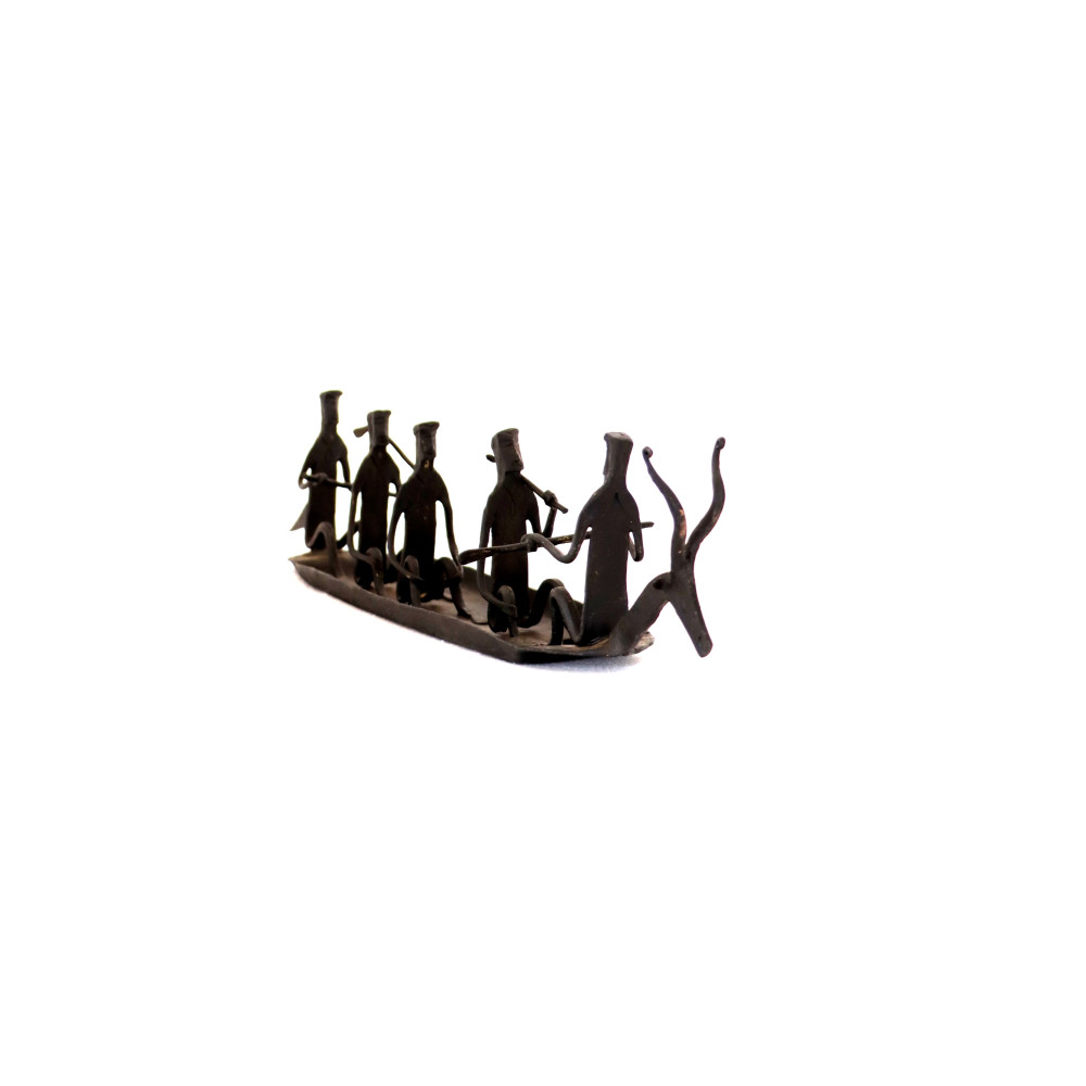 Tribal group on boat with Deer head - 1